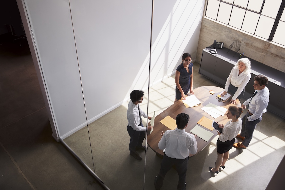 female-manager-in-team-meeting-elevated-view-thro-2026-01-05-22-49-01-utc