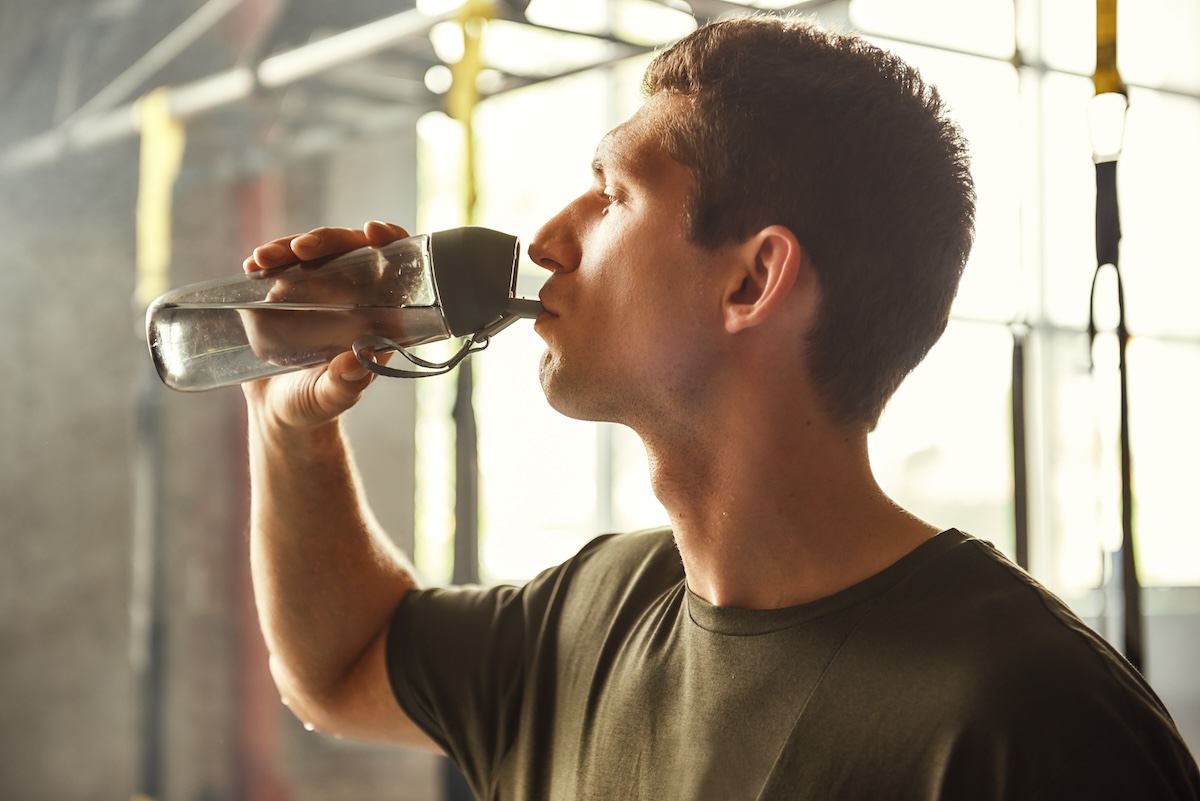 so-thirsty-young-athletic-man-drinking-water-whil-2025-03-25-08-31-53-utc