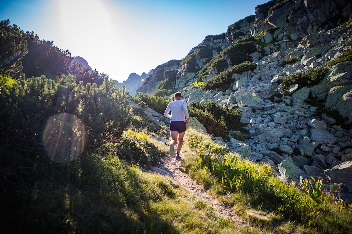trail-runner-running-in-mountain-landscape-at-suns-2025-03-26-21-09-09-utc