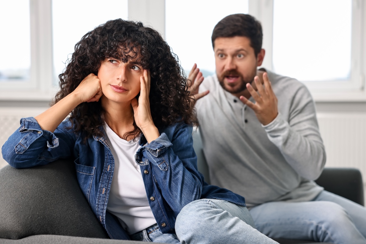 emotional-couple-having-quarrel-on-sofa-at-home-s-2025-07-20-22-53-40-utc